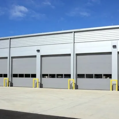 Commercial sectional garage door repair — Atlanta metro warehouse